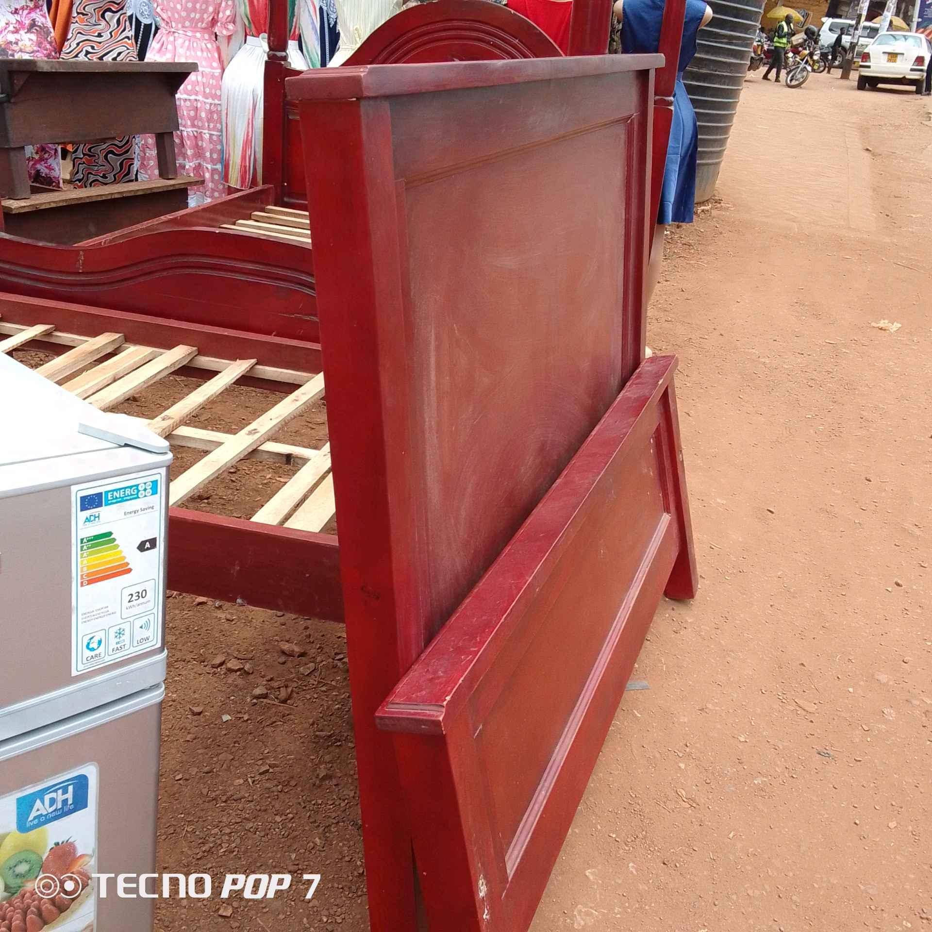 Slightly used 5by6 Wooden Bed In Good Condition for sale in Kampala - Yilick