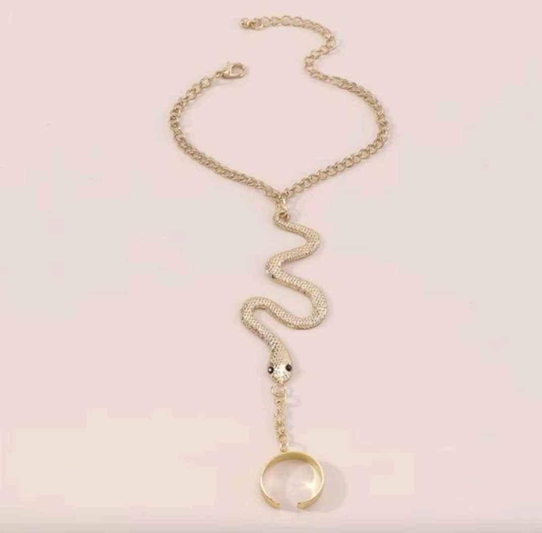 Women snake bracelet connecting finger ring hand jewelry for sale in Kampala - Yilick