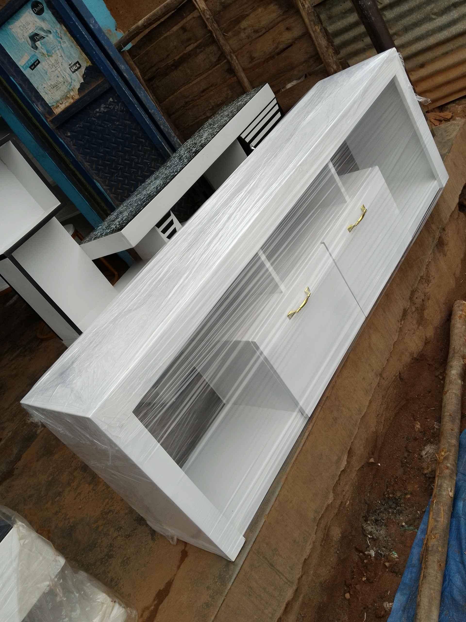 Tv stand/ Tv stands/Brand new Tv stands/White Tv stand Brand for sale in Kampala - Yilick