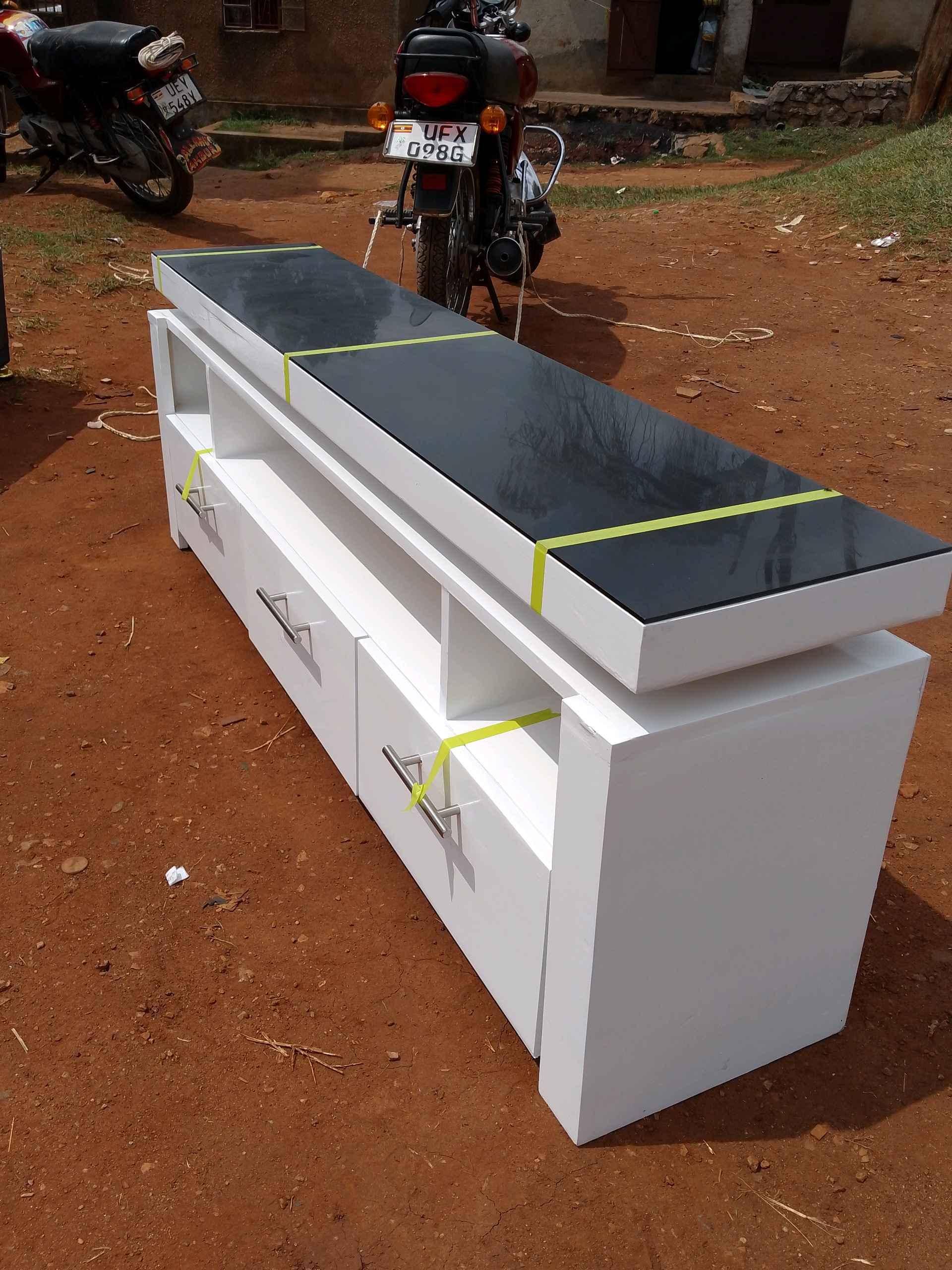 Tv stand/ Tv stands/Brand new Tv stands/White Tv stand Brand for sale in Kampala - Yilick