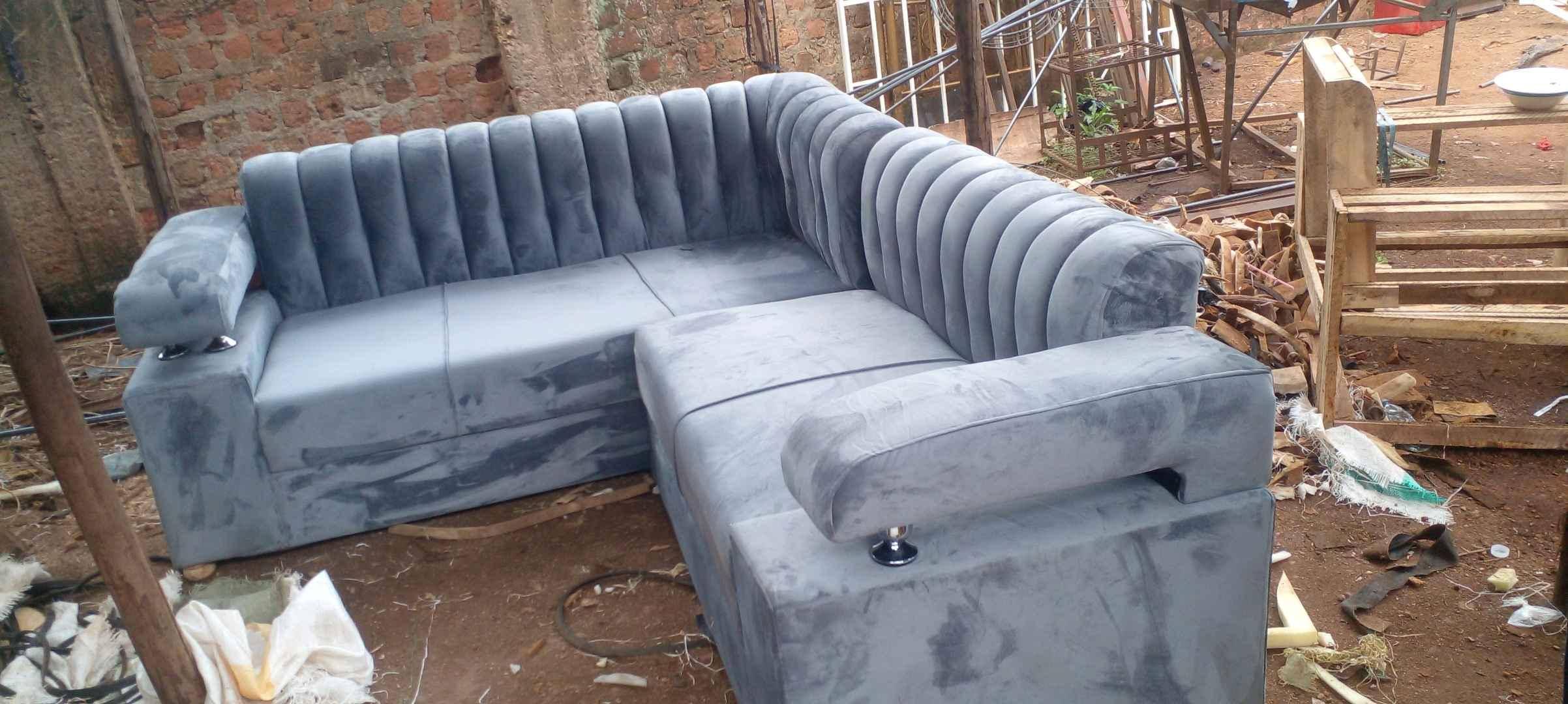 Gray min L shaped couch readily available for sale in Kampala - Yilick