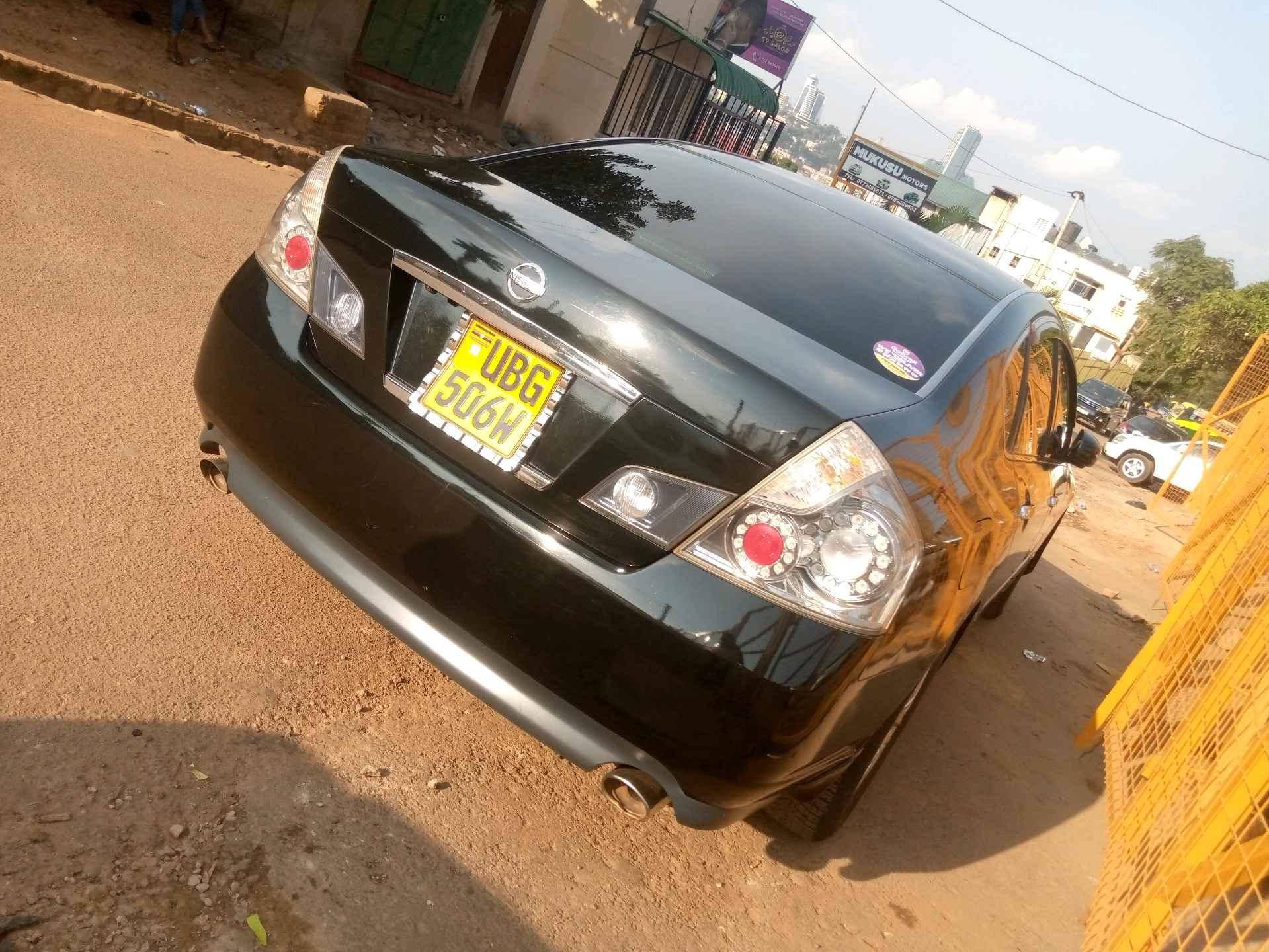 Nissan fuga colour black for sale in Kampala - Yilick