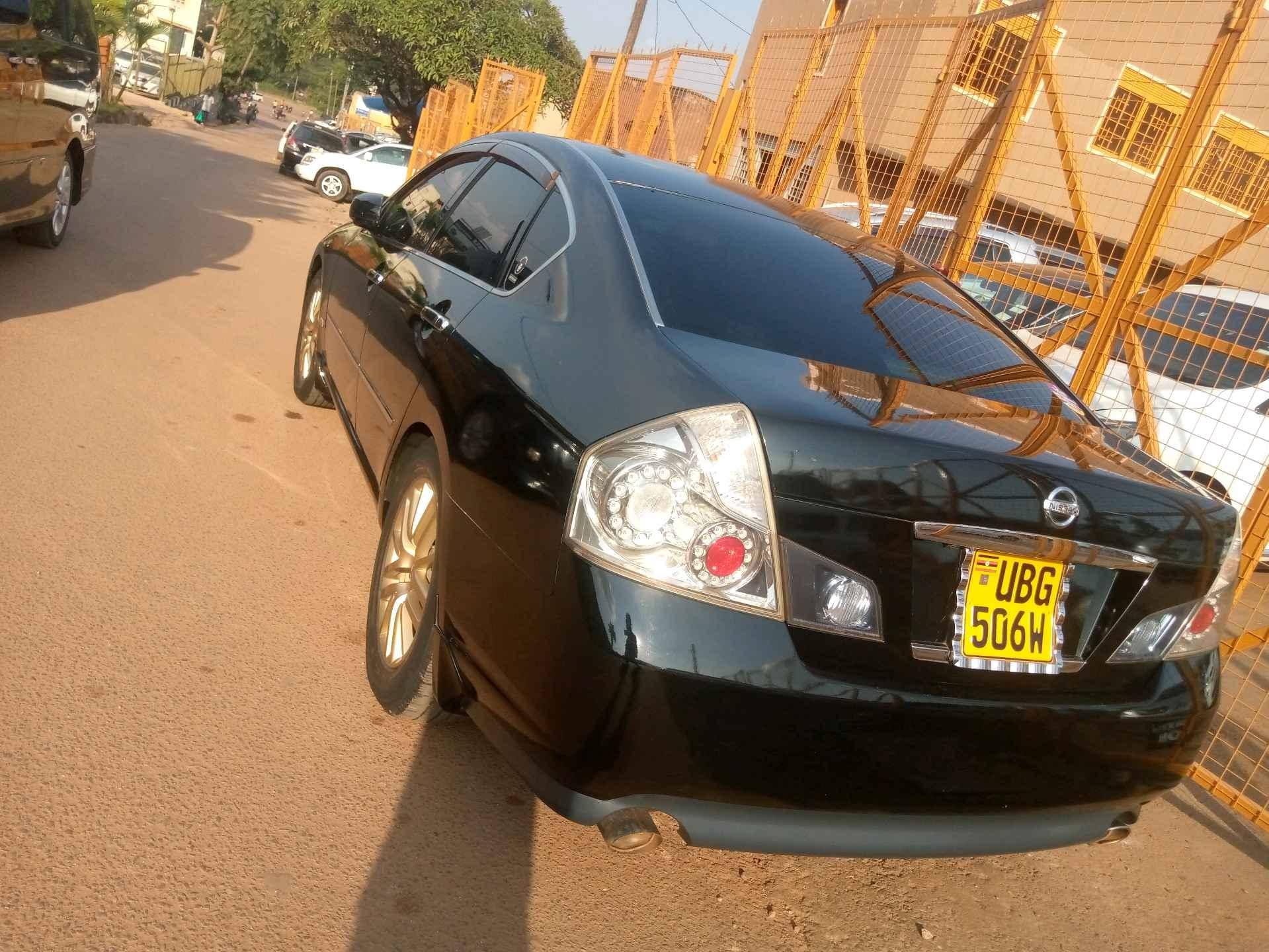 Nissan fuga colour black for sale in Kampala - Yilick
