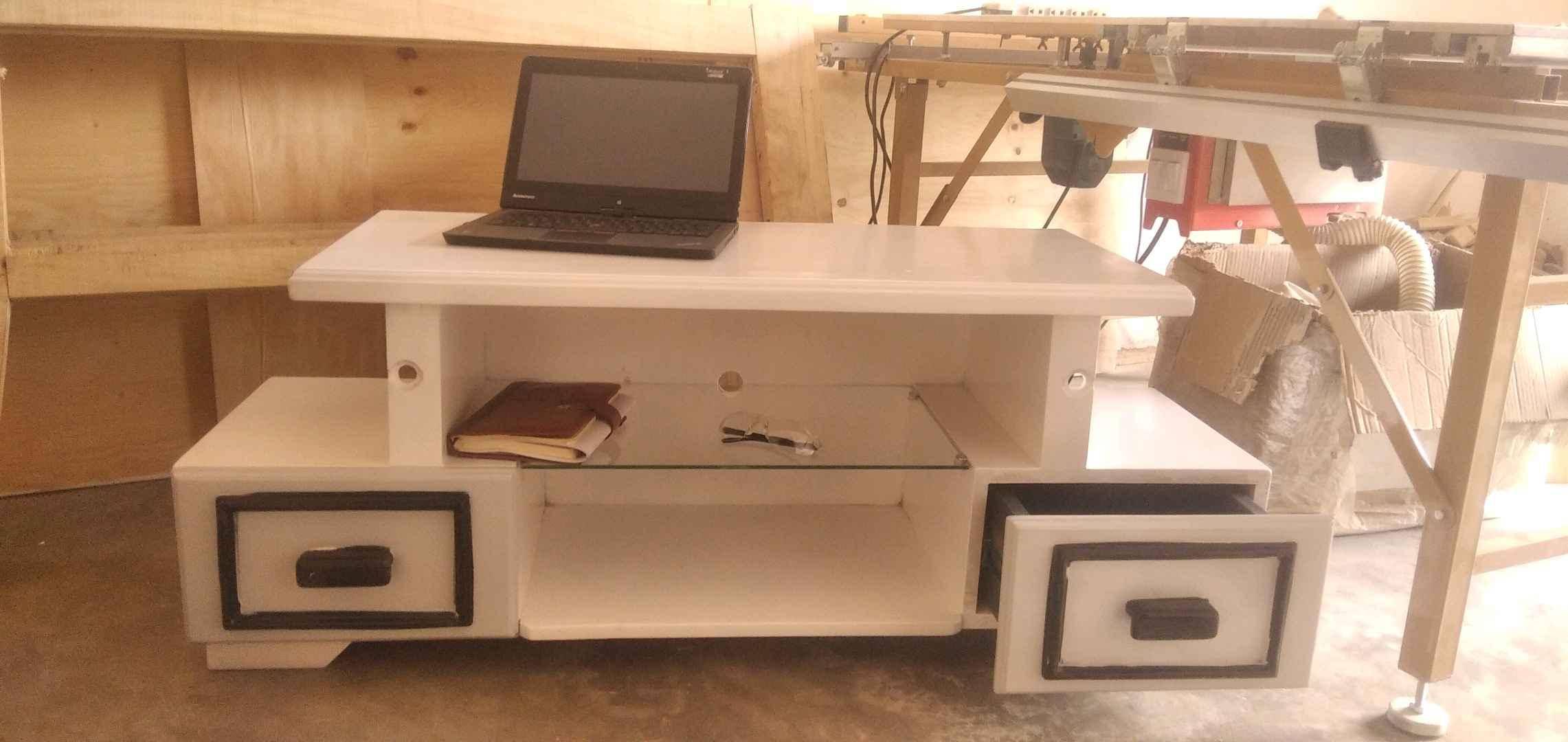 TV Stand with 2 drawers and a glass shelve for sale in Kampala - Yilick