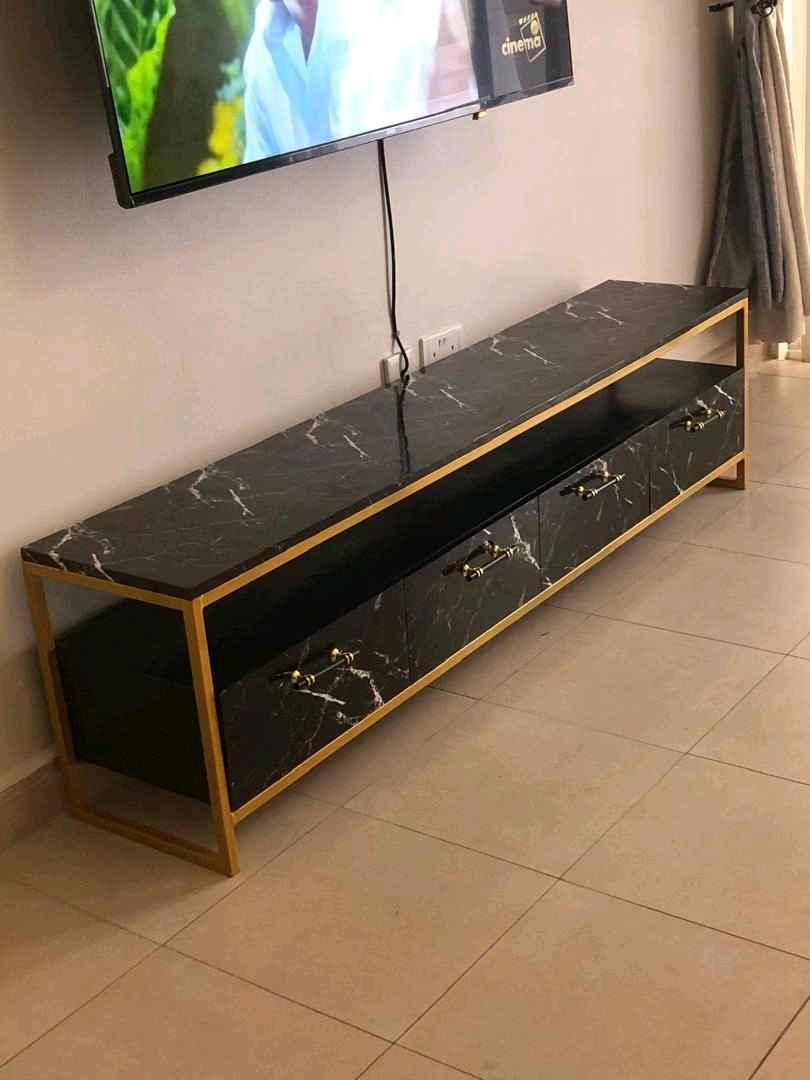 TV stand black and gold for sale in Kampala - Yilick
